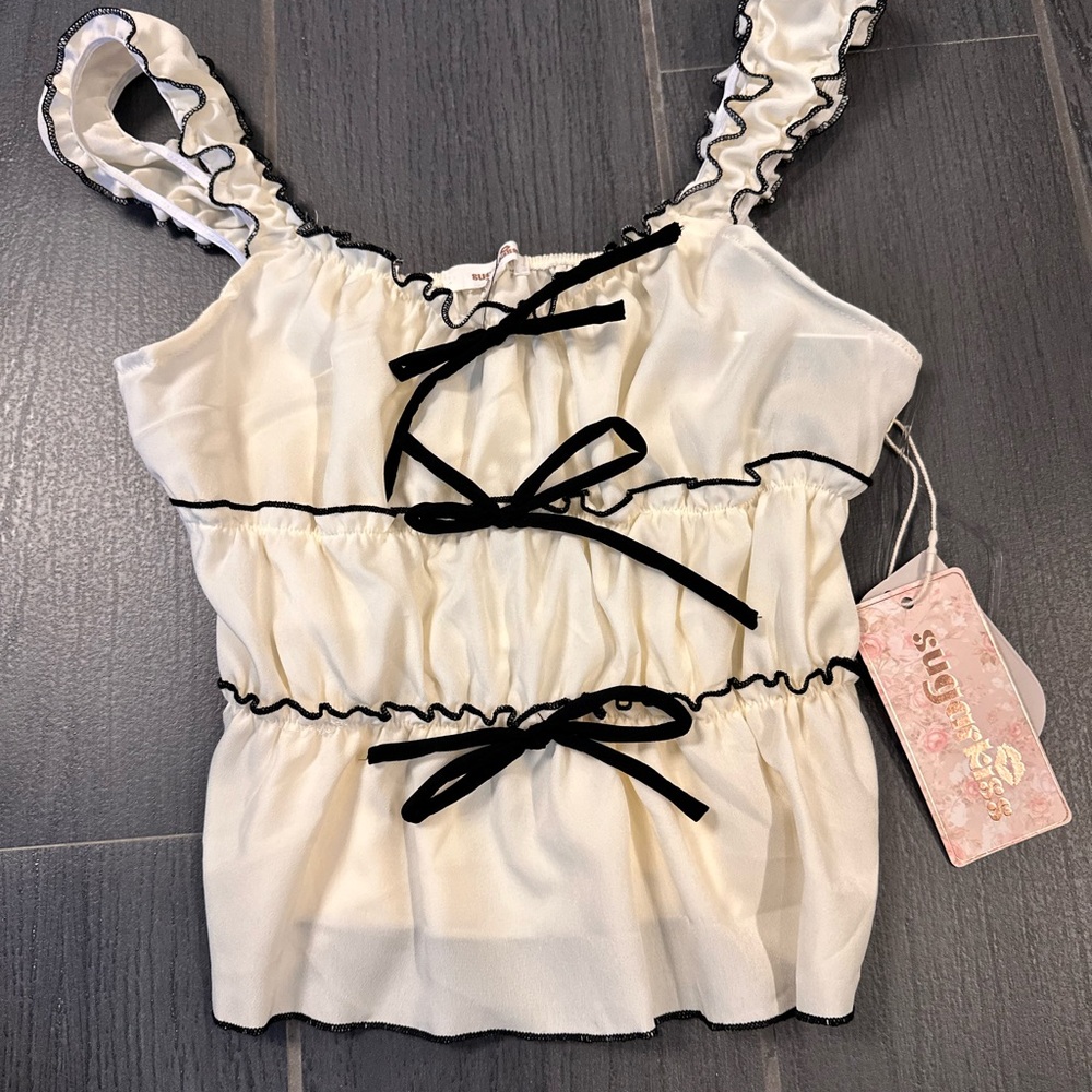 Stylish White and Black Ruffle Top